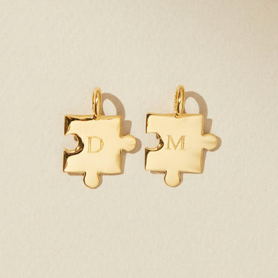Engravable puzzle piece charm with initial