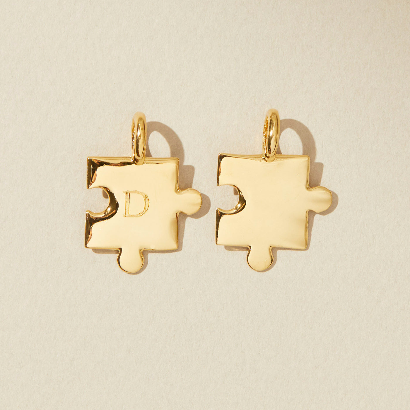 Puzzle piece charms that connect