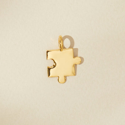 Puzzle piece pendant for autism awareness